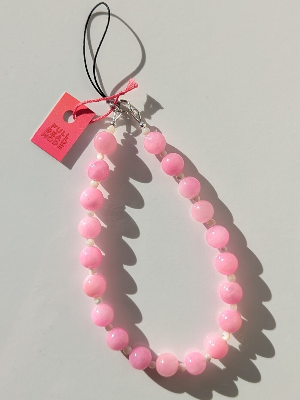 BNWT Full Bead Mode Phone Strap